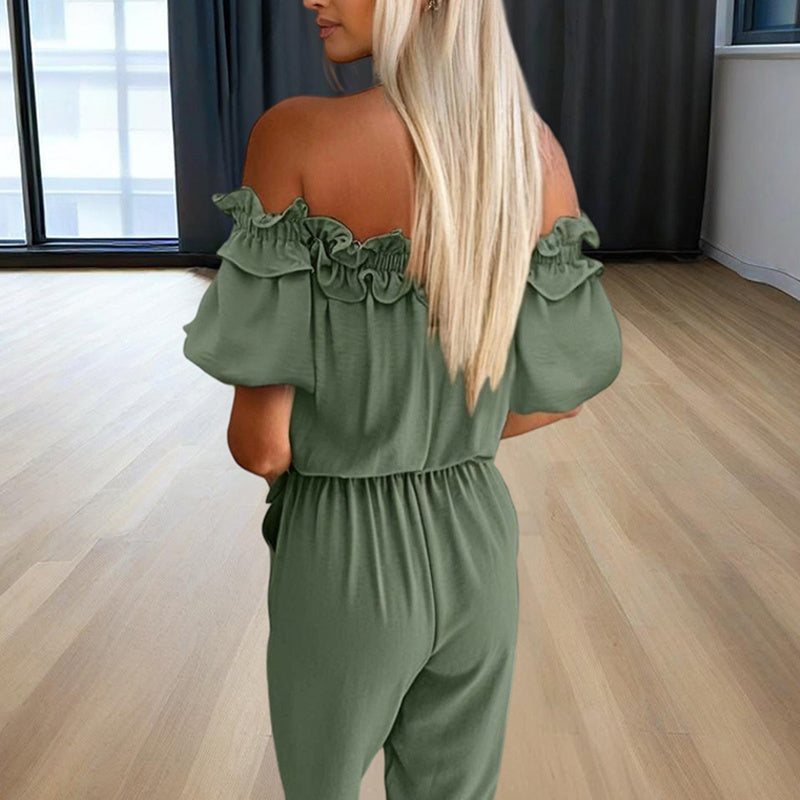 Back view of woman wearing an elegant off-shoulder jumpsuit for women in olive green with ruffle details