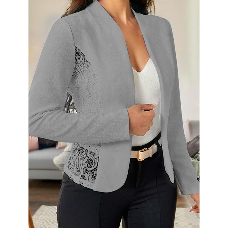Gray women's lace open front cardigan with floral lace detail worn over white top and black pants