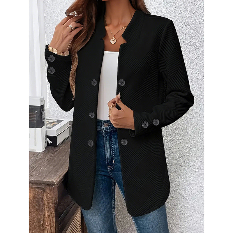 Black women's open front blazer jacket styled with white top and blue jeans for casual look