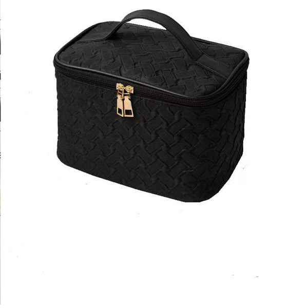 LUNIVA CARE USA black waterproof cosmetic bag with compartments featuring a textured design and top handle