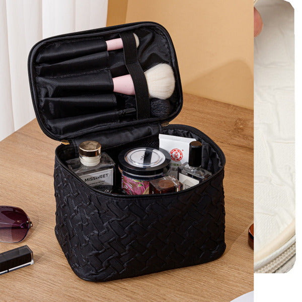 LUNIVA CARE USA waterproof cosmetic bag with compartments holding makeup brushes and skincare products