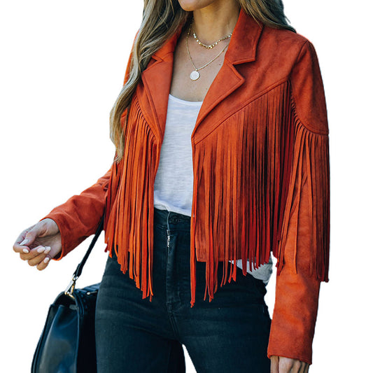 Orange women's faux suede fringe jacket with long sleeves and front collar worn with black jeans