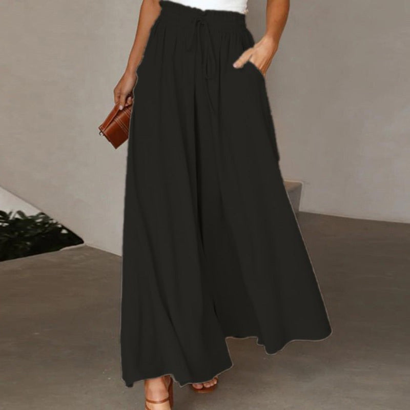 Women's high waist wide leg pants in black with drawstring waist and side pockets