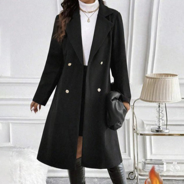 Black women's long sleeve knit jacket with double-breasted buttons styled with white turtleneck and accessories