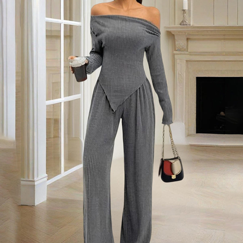 Gray ribbed women's off-shoulder lounge set with long sleeves and wide-leg pants in cozy fabric