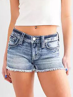 Womens ripped jean shorts in blue denim with frayed hems and front pockets