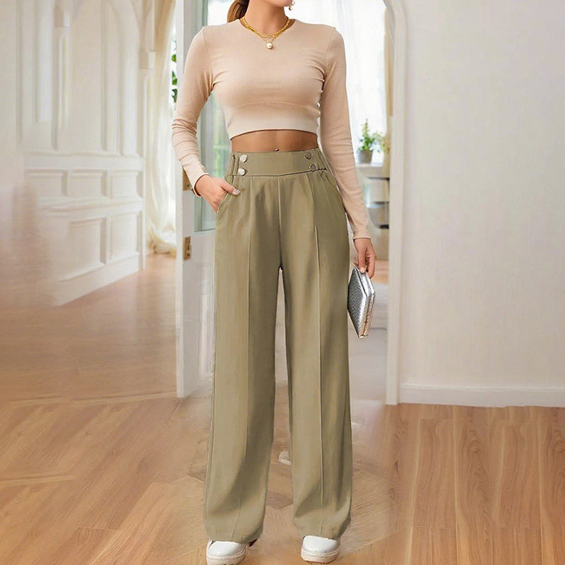 Woman wearing women's wide leg business trousers in olive green with high waist and button details
